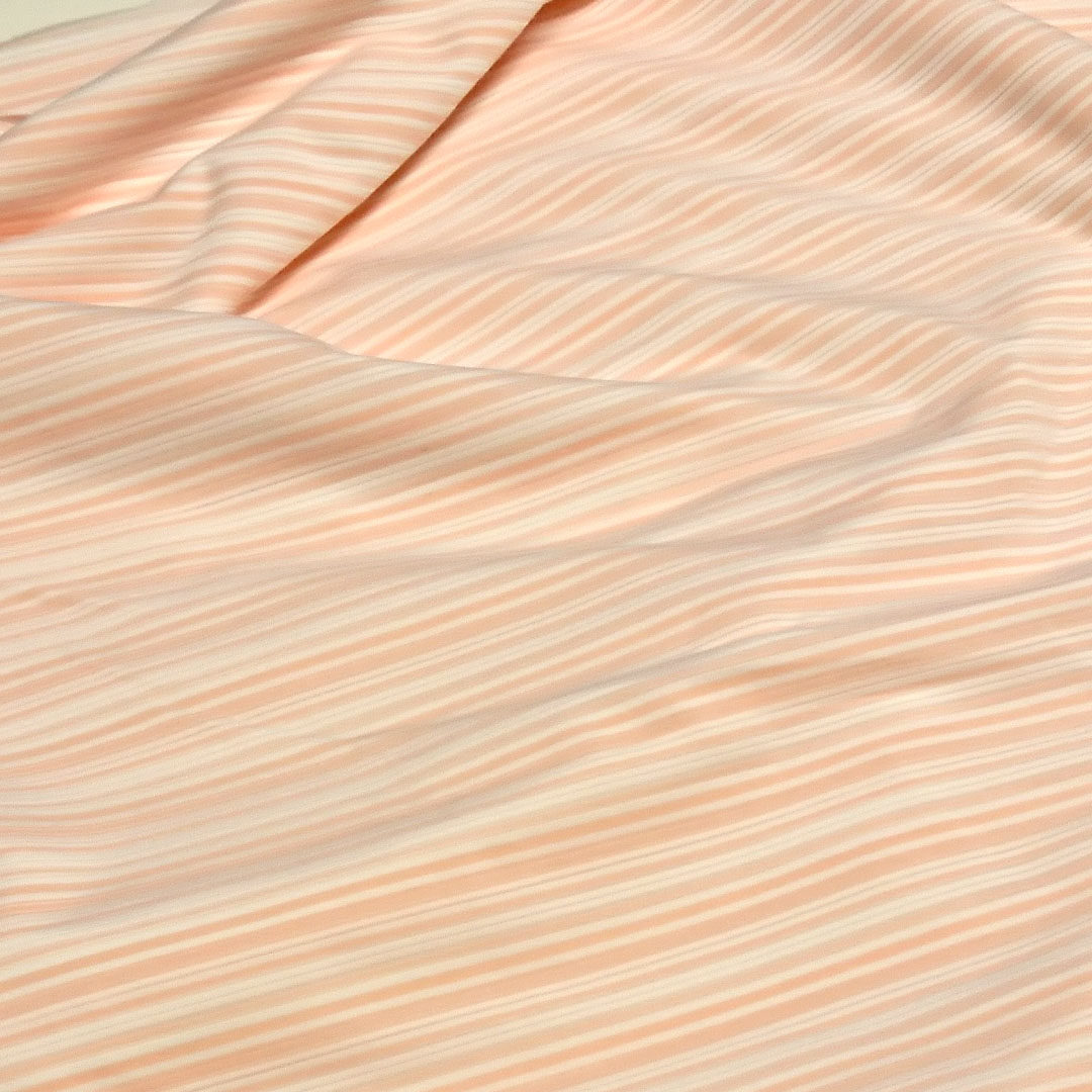 Baumwolljersey Apricot-Weiß gestreift
